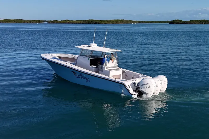 Slide: The Image of 2021 Streamline 35 CC boat cruising on calm blue waters. - 51