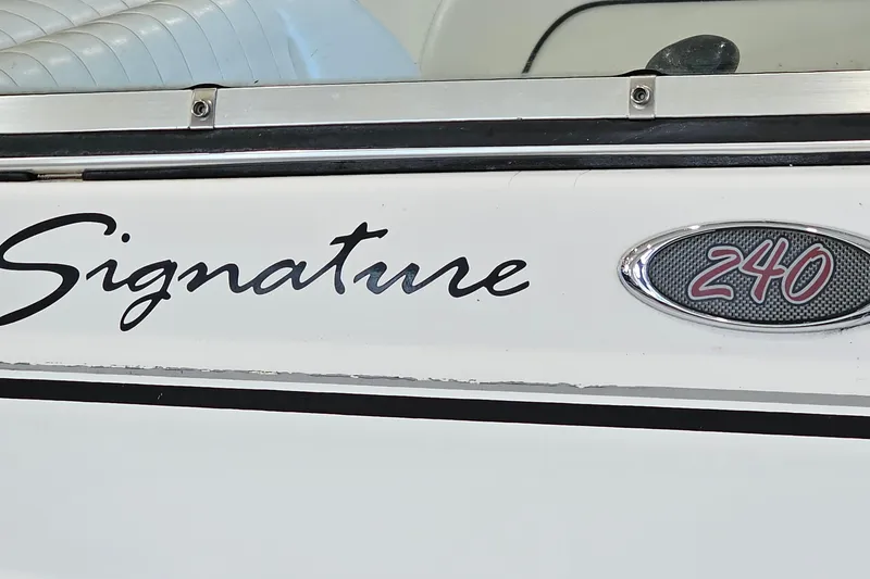 Slide: The Image of 2001 Chaparral Signature 240 boat emblem and logo detail. - 21