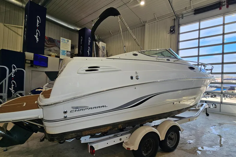 Slide: The Image of 2001 Chaparral Signature 240 boat on trailer in indoor showroom. - 3