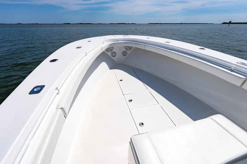 Slide: The Image of 2019 Onslow Bay 33 Tournament boat on calm waters under a clear sky. - 20
