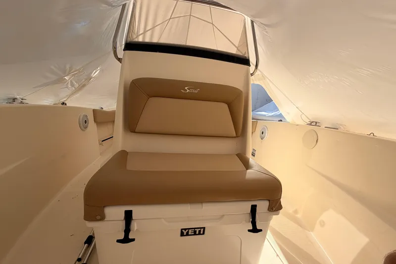 Slide: The Image of 2020 Scout 195 Sportfish boat interior with Yeti cooler seat. - 13