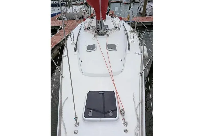 Slide: The Image of Beneteau First 36.7 sailboat deck, 2002 model, docked at marina. - 4
