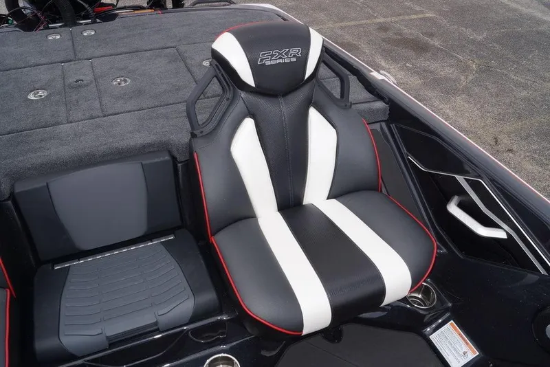 Slide: The Image of 2026 Skeeter FXR20 PRO boat seat with black, white, and red design. - 18