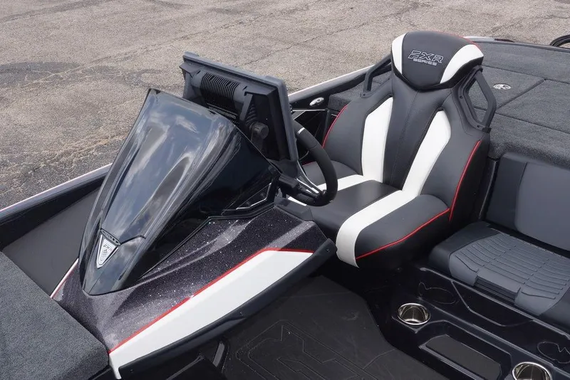 Slide: The Image of 2026 Skeeter FXR20 PRO boat interior with sleek black and white seating. - 23