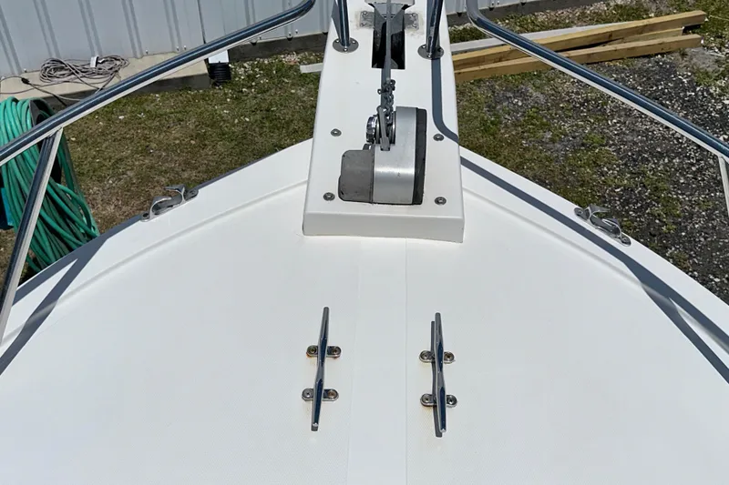 Slide: The Image of Bow of 2009 Steiger Craft 255 Miami boat with anchor and cleats. - 13