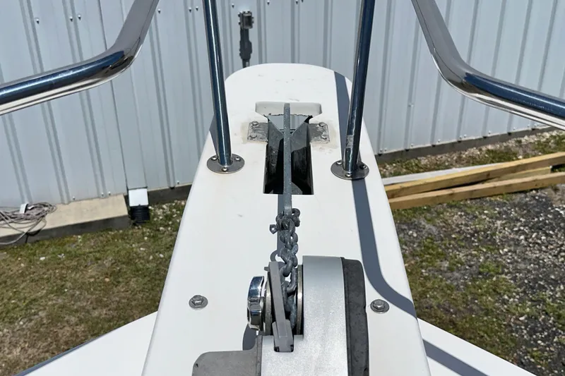 Slide: The Image of Bow view of 2009 Steiger Craft 255 Miami boat with anchor chain and railing. - 14