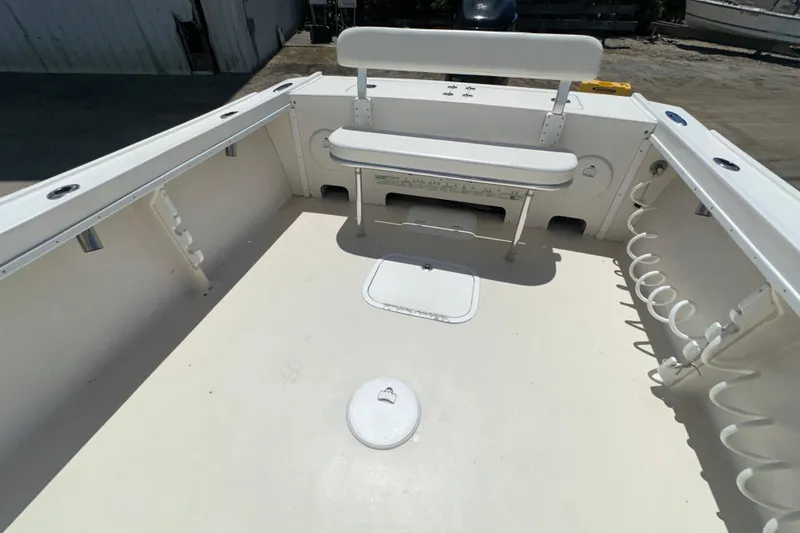 Slide: The Image of 2009 Steiger Craft 255 Miami boat deck with seating and rod holders. - 23