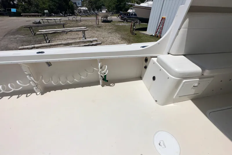 Slide: The Image of 2009 Steiger Craft 255 Miami boat deck with seating and storage compartments. - 27