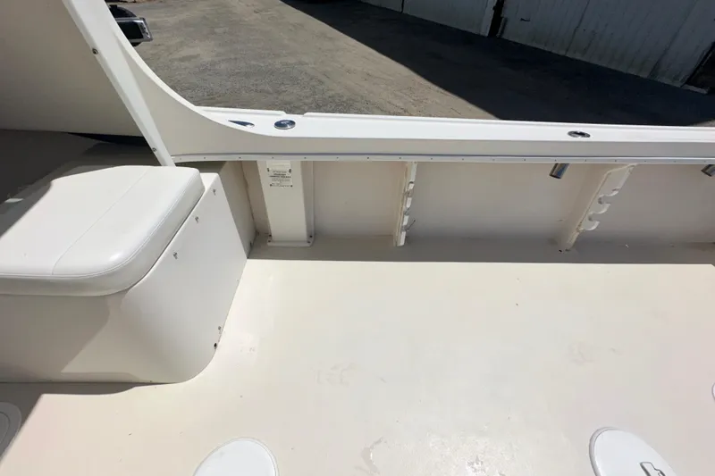 Slide: The Image of 2009 Steiger Craft 255 Miami boat interior with seating and rod holders. - 36