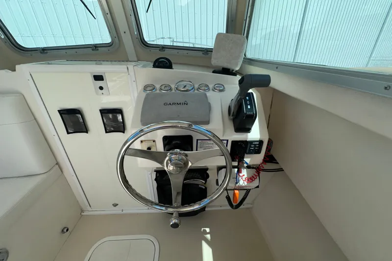 Slide: The Image of 2009 Steiger Craft 255 Miami boat helm with Garmin navigation system. - 38