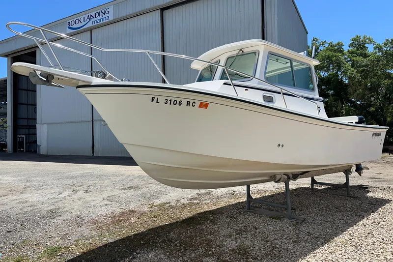 Slide: The Image of 2009 Steiger Craft 255 Miami boat on dry dock at Rock Landing Marina. - 4
