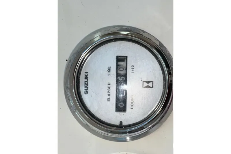 Slide: The Image of Suzuki elapsed time gauge on 2009 Steiger Craft 255 Miami boat dashboard. - 40