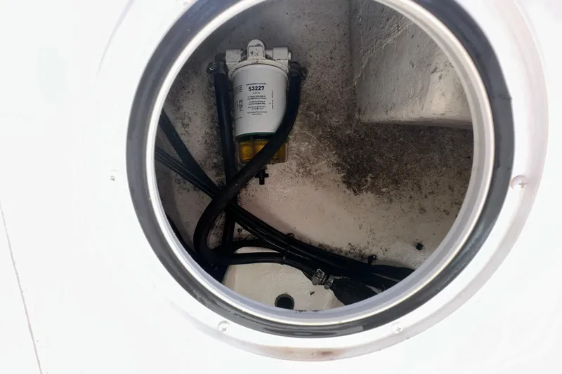 Slide: The Image of Fuel filter compartment of a 2009 Steiger Craft 255 Miami boat. - 42