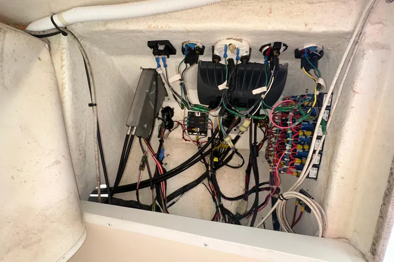Slide: The Image of Electrical wiring and components inside a 2009 Steiger Craft 255 Miami boat. - 45