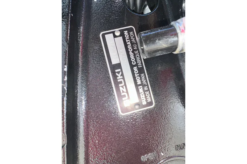 Slide: The Image of Suzuki Motor Corporation label on 2009 Steiger Craft 255 Miami boat engine. - 46