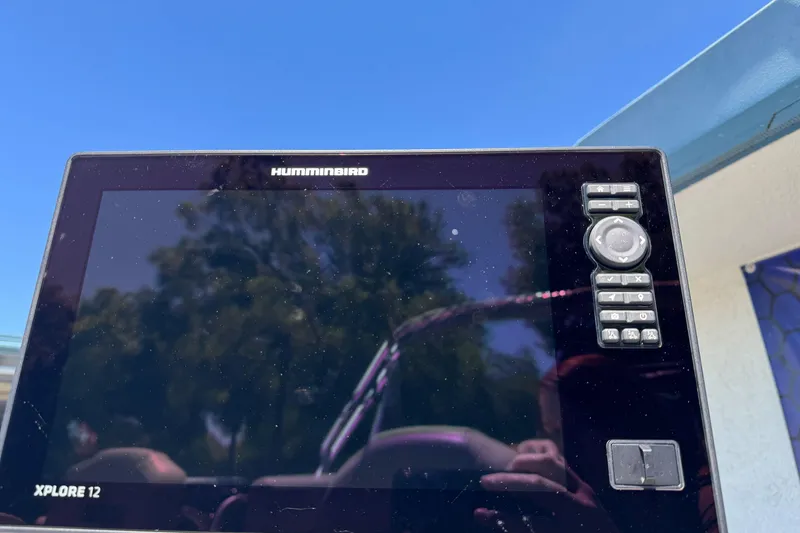 Slide: The Image of Humminbird Xplore 12 fish finder on 2025 Sun Tracker Bass Buggy 18 DLX boat. - 10