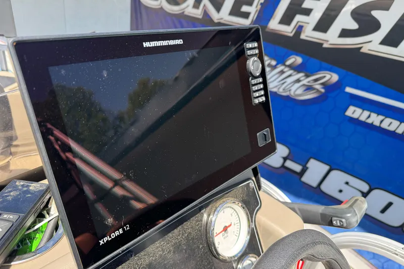 Slide: The Image of Humminbird Xplore 12 fish finder on 2025 Sun Tracker Bass Buggy 18 DLX boat dashboard. - 19
