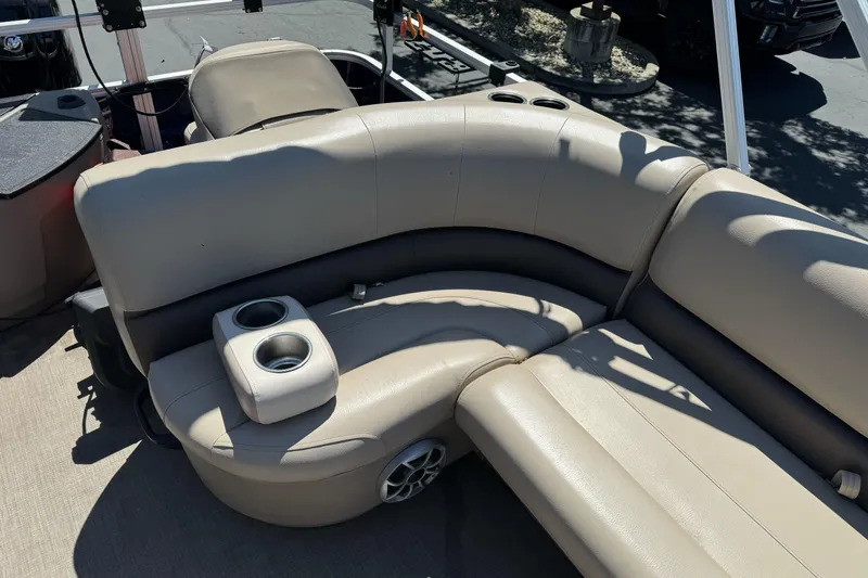 Slide: The Image of Luxurious seating on 2025 Sun Tracker Bass Buggy 18 DLX pontoon boat with cup holders. - 21