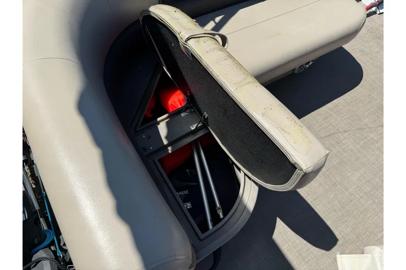 Slide: The Image of Storage compartment in 2025 Sun Tracker Bass Buggy 18 DLX pontoon boat. - 23