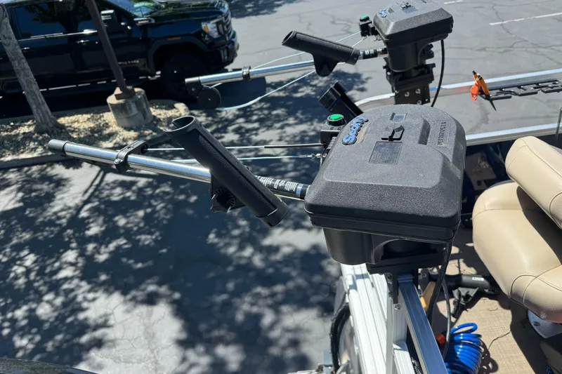 Slide: The Image of Fishing rod holders on a 2025 Sun Tracker Bass Buggy 18 DLX pontoon boat. - 24