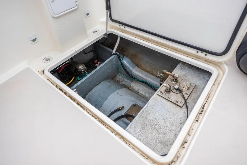 Slide: The Image of 2005 Back Cove Downeast Hardtop engine compartment, showcasing internal components and wiring. - 44