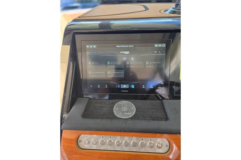 Slide: The Image of Touchscreen control panel on 2023 Chris-Craft Calypso 35 boat, featuring Garmin interface. - 19