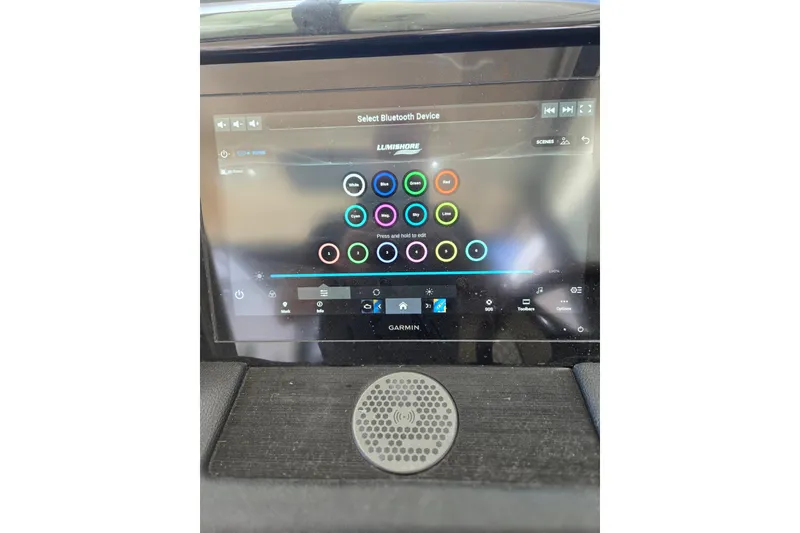 Slide: The Image of Touchscreen control panel on 2023 Chris-Craft Calypso 35 boat, displaying Bluetooth and lighting options. - 20