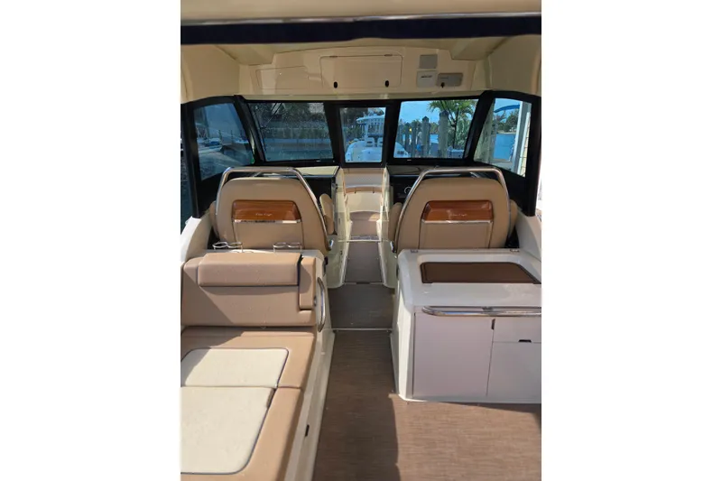 Slide: The Image of Interior of 2023 Chris-Craft Calypso 35 boat, featuring luxurious seating and modern design. - 9