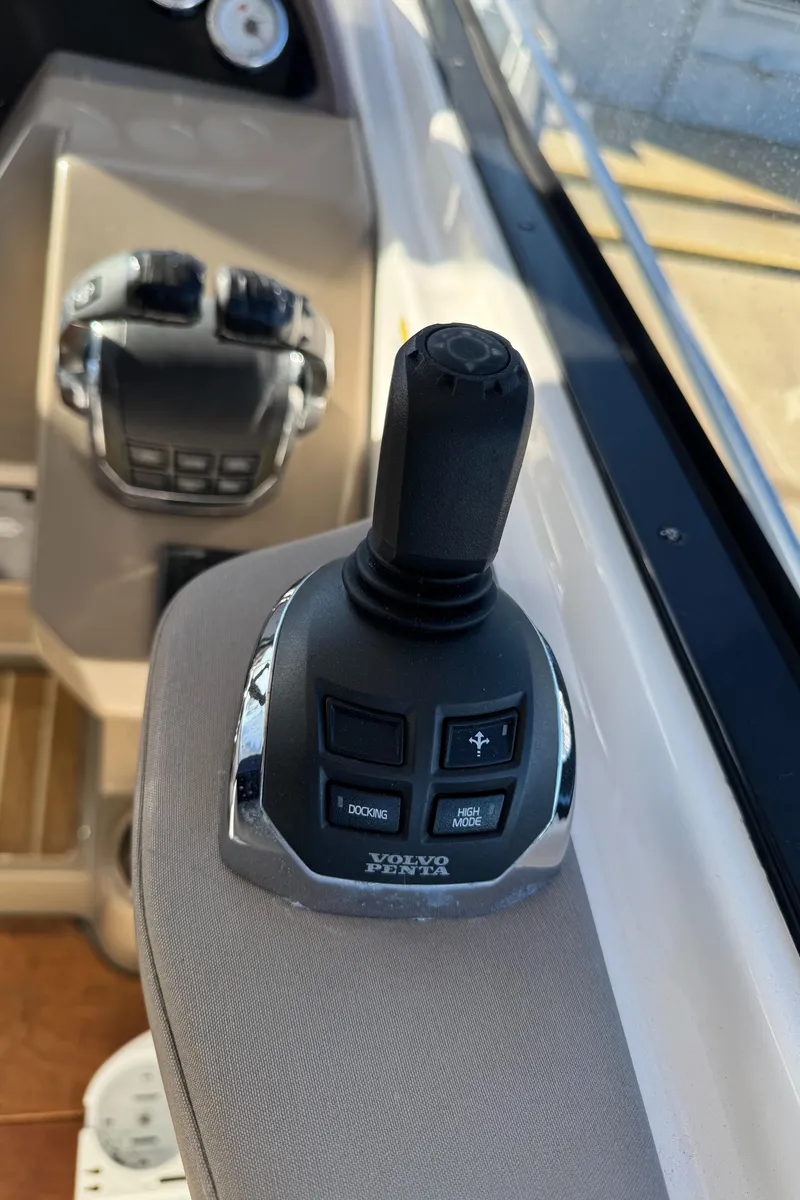 Slide: The Image of Joystick control on 2016 Regal 35 Sport Coupe boat dashboard. - 33