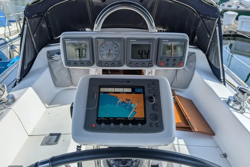Slide: The Image of Cockpit of 2007 Catalina 36 MkII sailboat with navigation instruments and GPS display. - 33