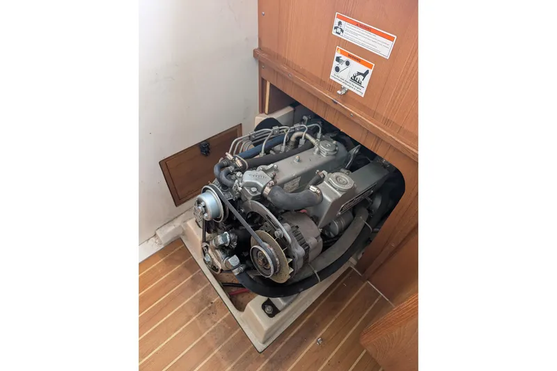 Slide: The Image of Engine compartment of a 2007 Catalina 36 MkII sailboat, showcasing mechanical components. - 30