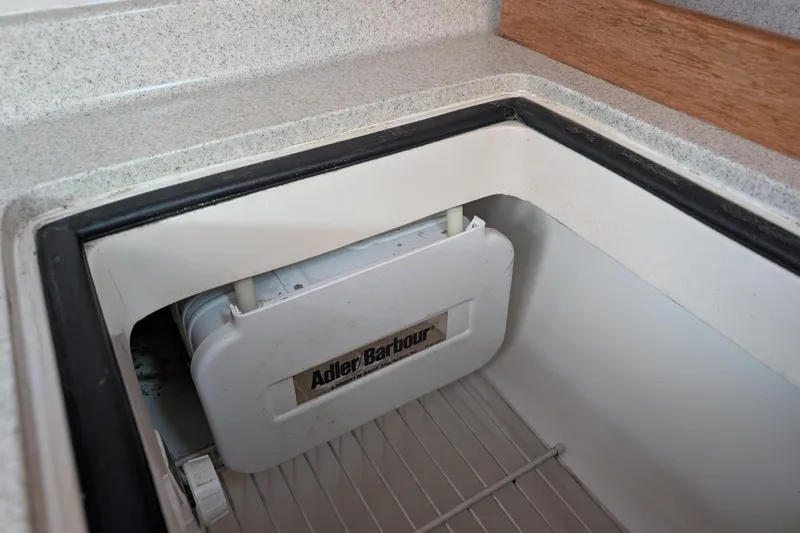 Slide: The Image of Adler Barbour refrigerator inside a 2007 Catalina 36 MkII sailboat galley. - 27