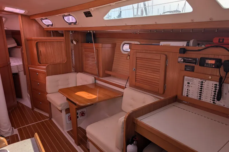 Slide: The Image of Interior of 2007 Catalina 36 MkII sailboat with wood finish and seating area. - 13