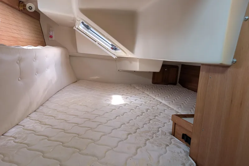 Slide: The Image of Interior cabin of 2007 Catalina 36 MkII sailboat with comfortable bedding. - 23
