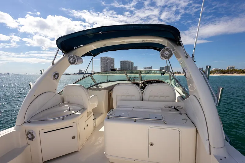 Slide: The Image of 2005 Sea Ray 340 Sundancer boat interior with ocean and city skyline view. - 12