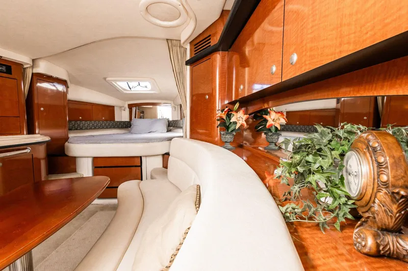 Slide: The Image of Luxurious interior of 2005 Sea Ray 340 Sundancer yacht with elegant wood finishes. - 19