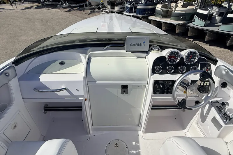 Slide: The Image of Interior view of a 2007 Donzi 27 ZR boat cockpit with sleek design. - 18