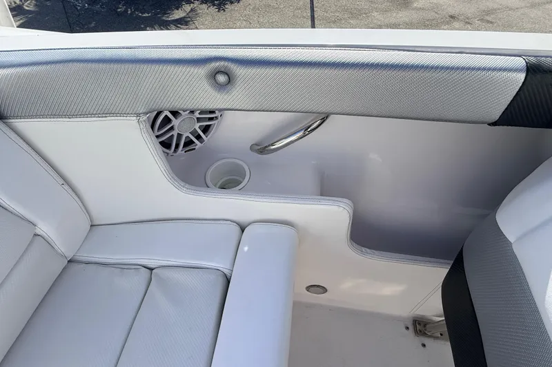 Slide: The Image of 2007 Donzi 27 ZR boat dashboard with steering wheel and gauges. - 25