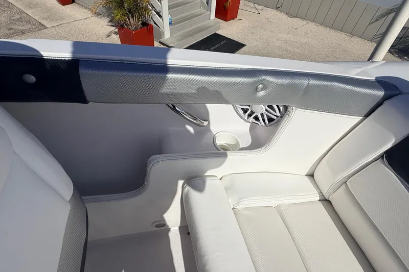 Slide: The Image of 2007 Donzi 27 ZR boat dashboard with Livorsi gauges and steering wheel. - 26