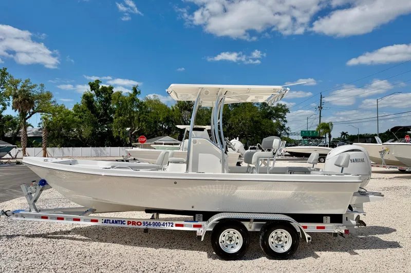 The Image of 2026 Bay Rider 219 Bay boat on trailer, sunny day, outdoor display. - 0