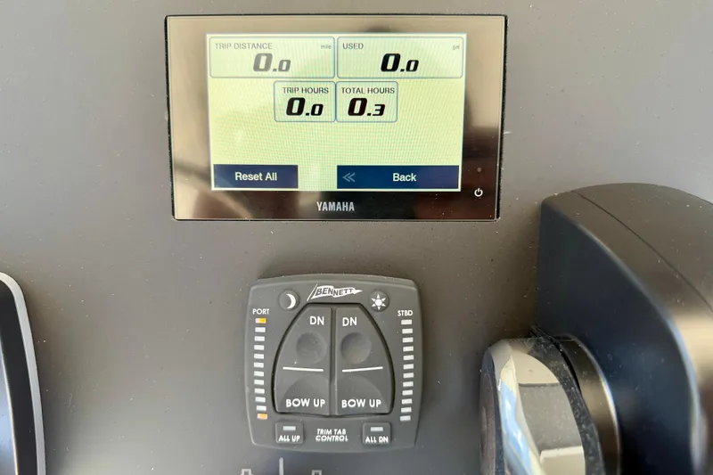 Slide: The Image of Yamaha display and controls on 2026 Bay Rider 219 Bay boat dashboard. - 18