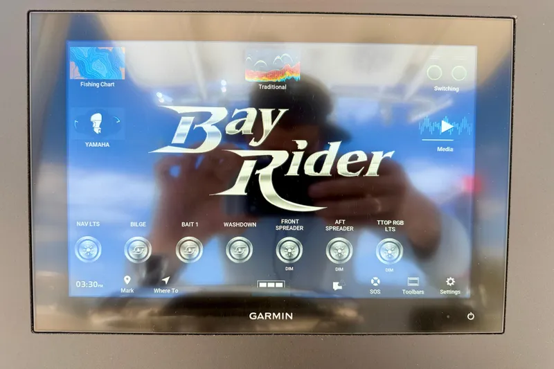 Slide: The Image of Touchscreen display of a 2026 Bay Rider 219 Bay boat with navigation and control options. - 19