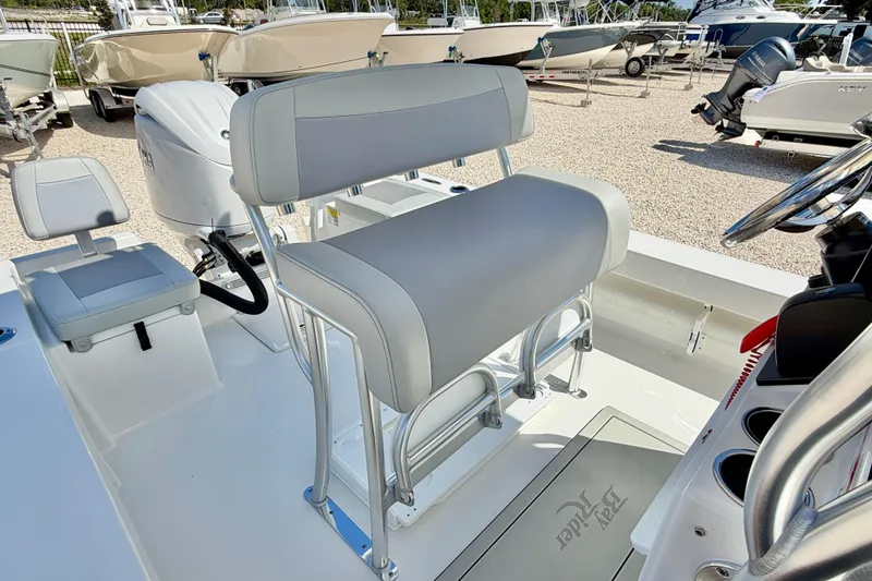 Slide: The Image of 2026 Bay Rider 219 Bay boat interior with seating and steering wheel. - 24