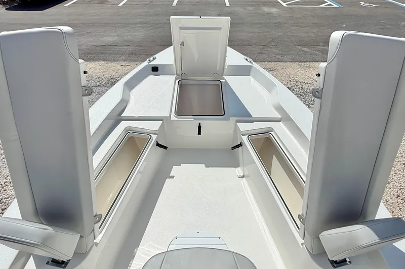 Slide: The Image of 2026 Bay Rider 219 Bay boat interior with open storage compartments. - 28