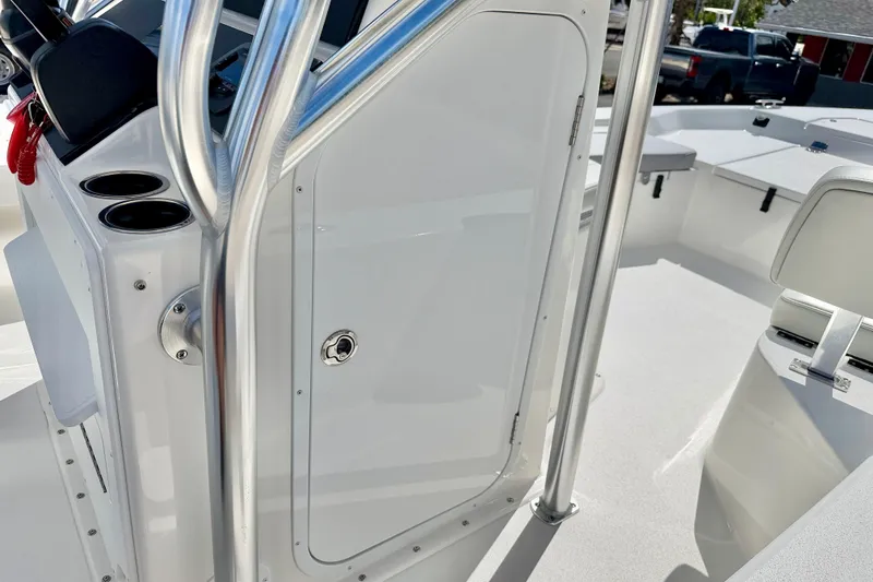 Slide: The Image of 2026 Bay Rider 219 Bay boat interior with console and seating area. - 39