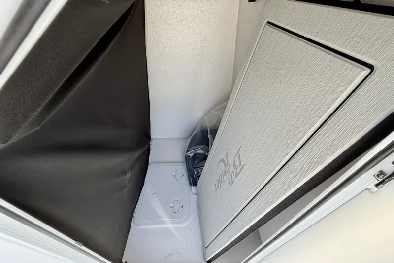 Slide: The Image of Storage compartment of 2026 Bay Rider 219 Bay boat, featuring sleek interior design. - 40