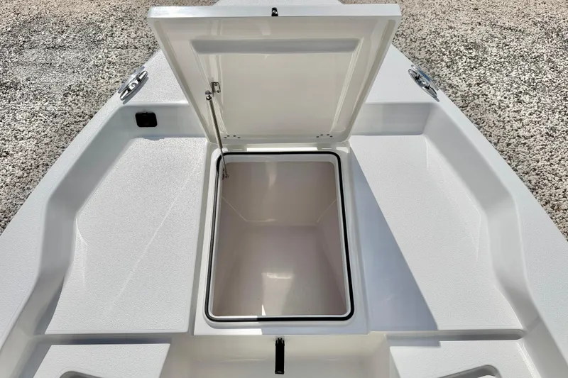 Slide: The Image of Open storage compartment on 2026 Bay Rider 219 Bay boat, showcasing spacious interior. - 41