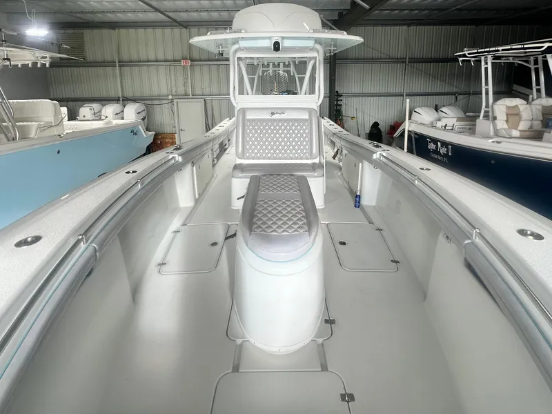 Slide: The Image of 2021 Yellowfin 36 Offshore boat interior with sleek design and spacious seating. - 13