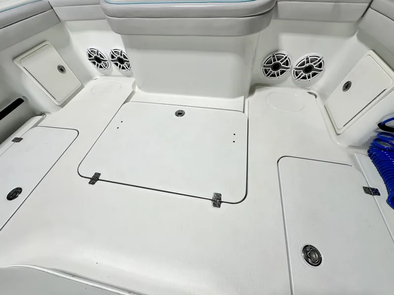 Slide: The Image of 2021 Yellowfin 36 Offshore boat deck with storage compartments and speakers. - 16