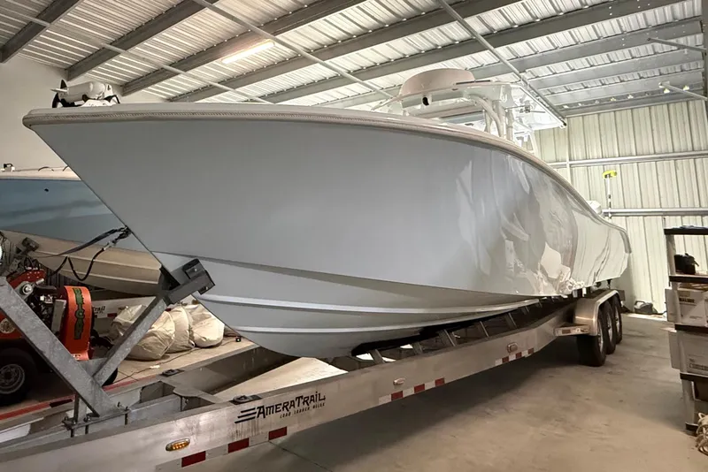 Slide: The Image of 2021 Yellowfin 36 Offshore boat on trailer in storage facility. - 20